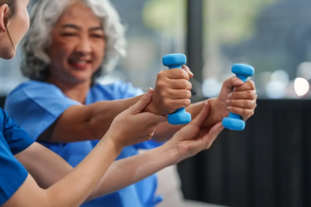 a-young-caucasian-physical-therapist-and-an-elderl-2026-01-08-05-39-23-utc