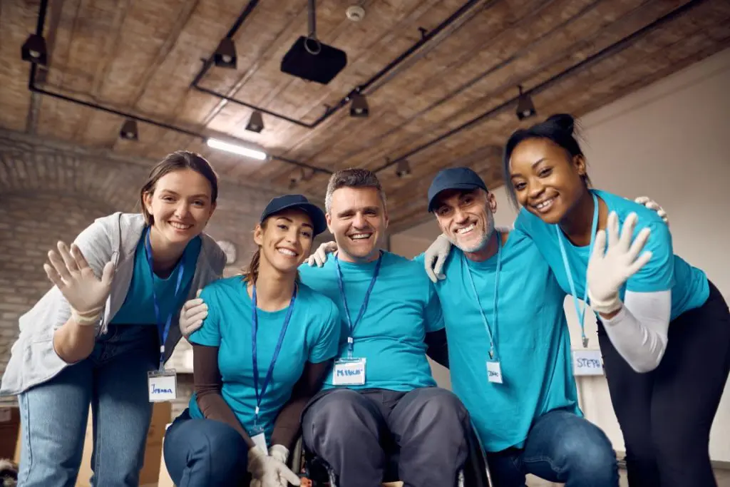 below-view-of-group-of-happy-volunteers-at-donatio-2026-01-06-10-27-47-utc